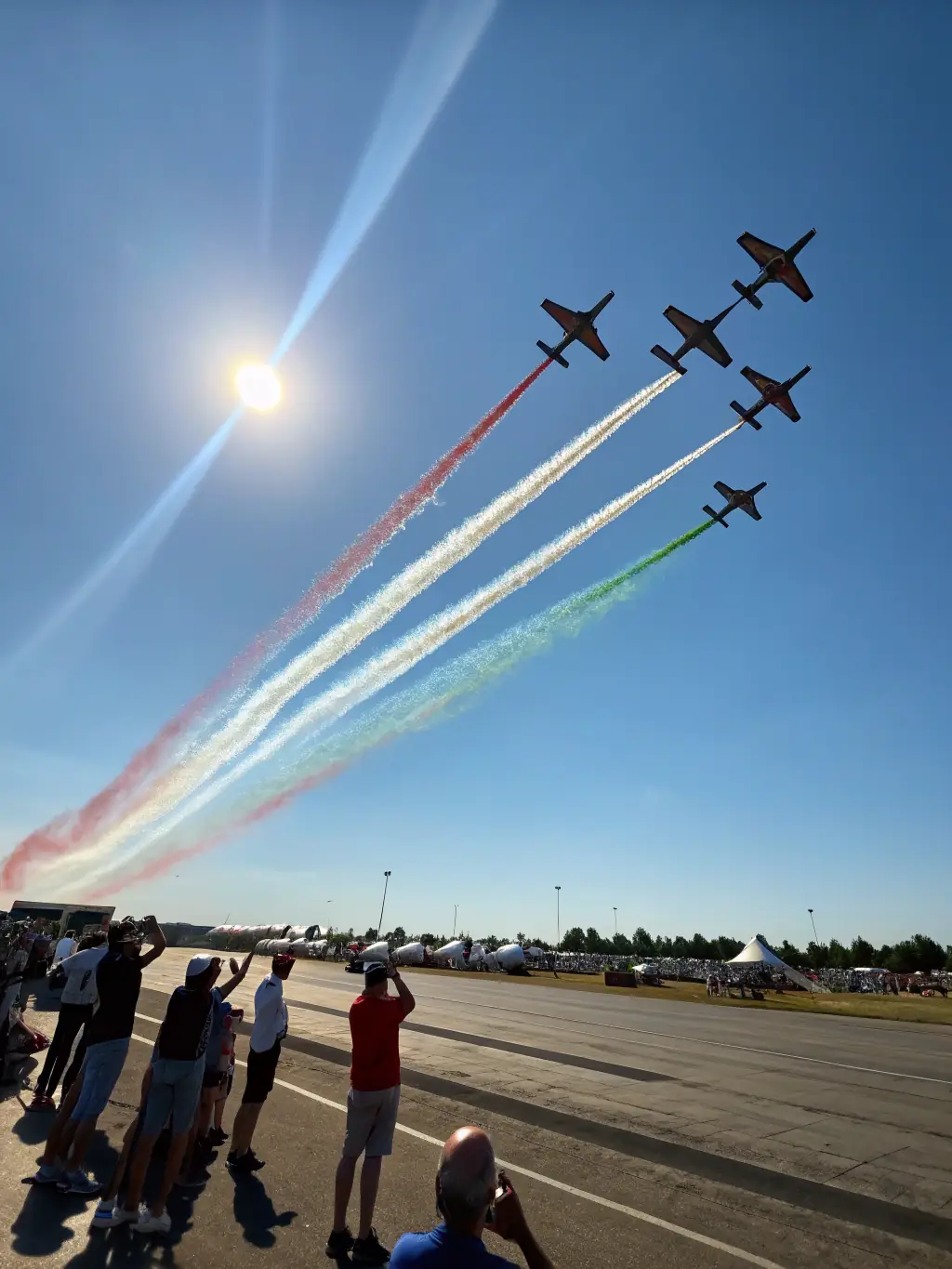 A dynamic shot of an ULM competition, capturing the excitement and skill involved in precision flying, with participants navigating a challenging course.